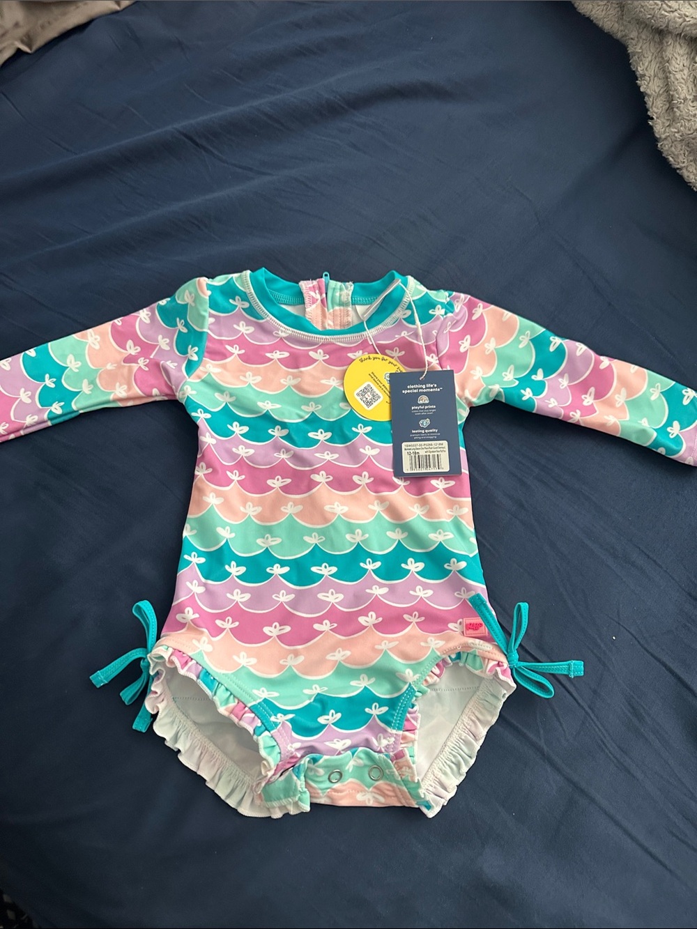 Kids Long-Sleeve One-Piece Swimsuit in Pastel Mermaid Print